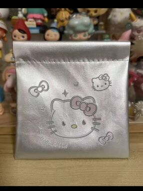 Hello Kitty Silver Pouch with Pink Bow Details